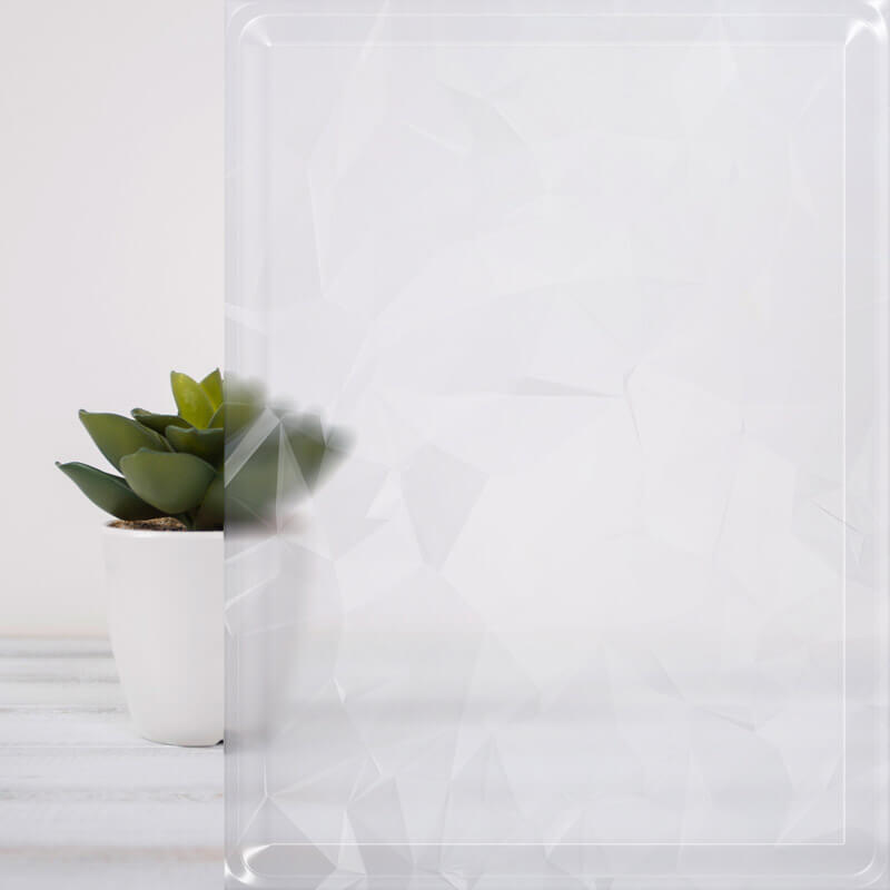 A small green succulent plant in a white pot sits on a white wooden surface. A translucent, geometric-patterned overlay, reminiscent of textured glass for windows, partially obscures the right side of the image.